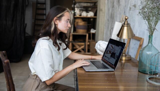content creator using laptop