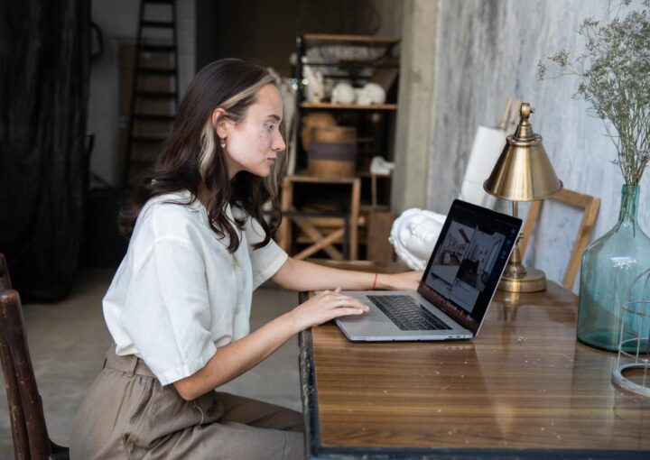 content creator using laptop