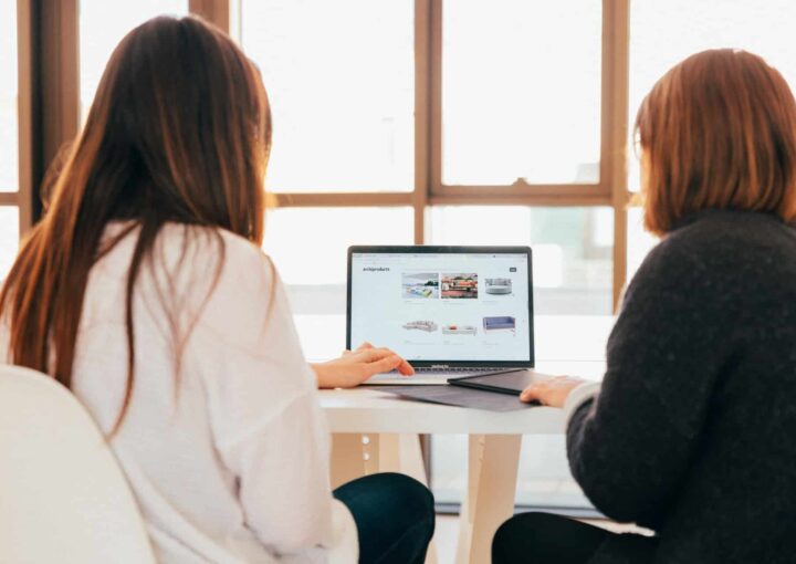 women looking at laptop