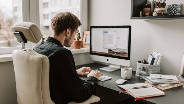 man working on computer