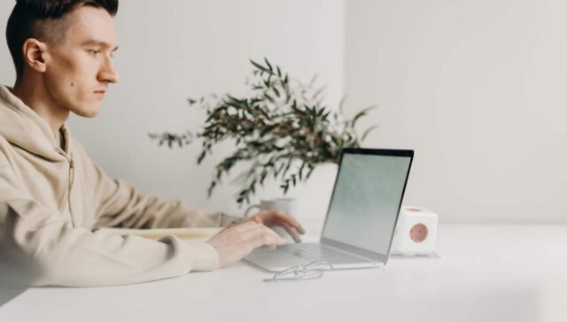 man using laptop